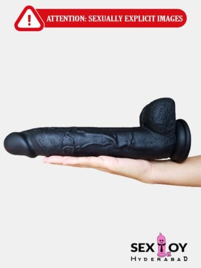 A black realistic dildo, 11 inches long, named Phantom.