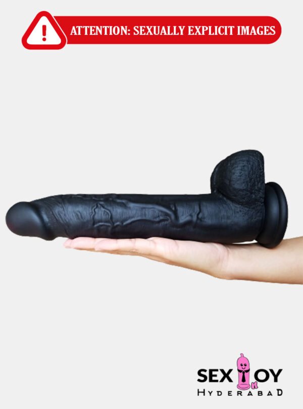 A black realistic dildo, 11 inches long, named Phantom.