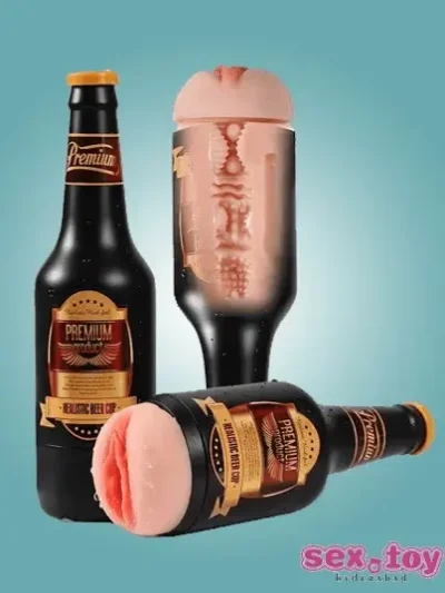 A close-up view of a Beer Bottle Flashlight shining brightly in a dark room.