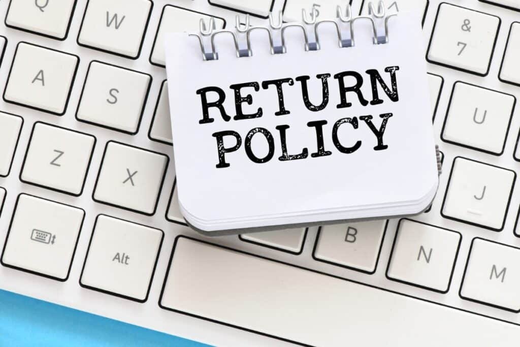 Return Policy Sign - A sign displaying return policy information.