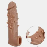 Double Hole Sleeve with textured bumps and spikes for added pleasure.