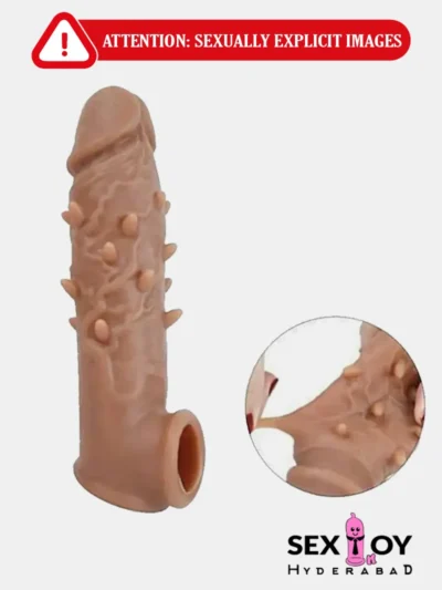 Double Hole Sleeve with textured bumps and spikes for added pleasure.