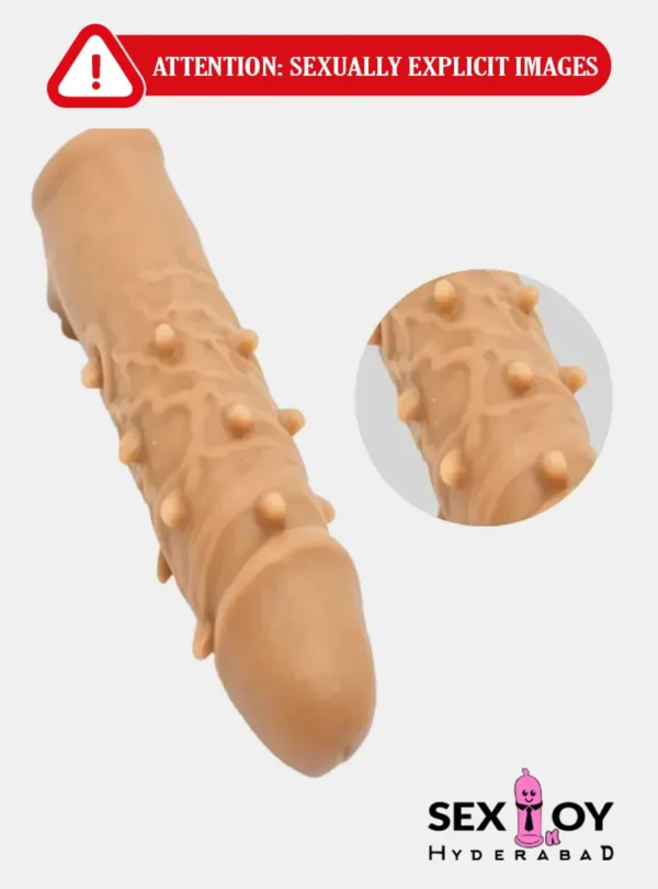 Double Hole Sleeve with bumps and spikes for extra pleasure.