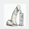 Realistic dildo with a strong suction base and handheld vibration controller for adult intimate wellness.